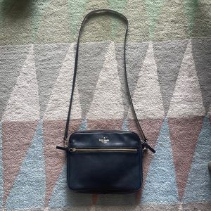 Black Kate Spade crossbody. Padded sides for use with an iPad.
